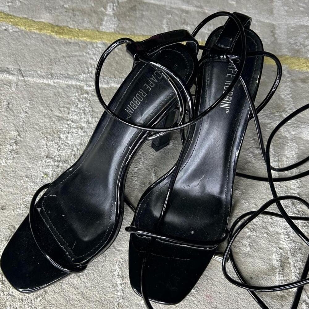 Black strappy sandals with a